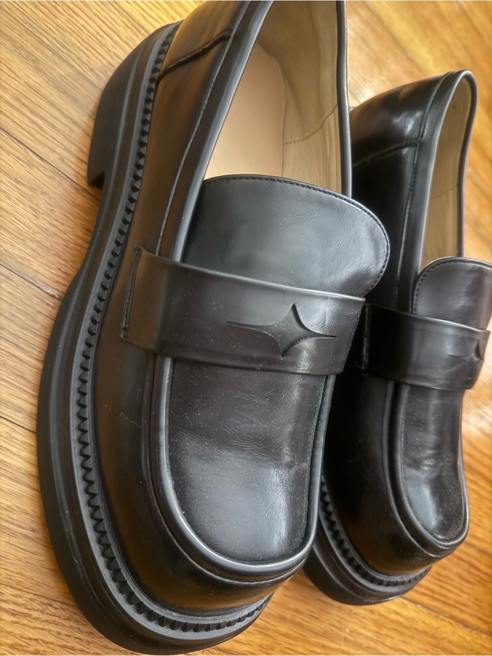 Black faux leather loafers with chunk sole
